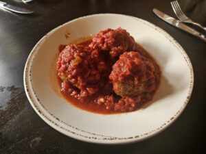 Meat balls come three at a time at Corrati's. Photograph by Drew Saunders.