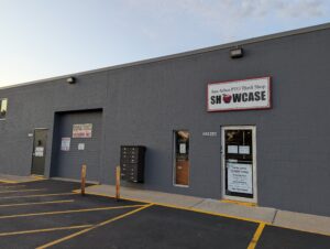 The Ann Arbor PTO Thrift building showing the "Showcase" and "Donations Unloading Only" signs.