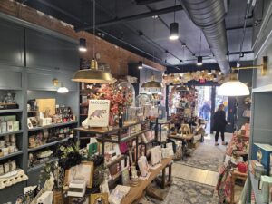 The main room of Noteworthy has two major tables in the middle, which set the theme of what is being on sale this season. Photo by Drew Saunders